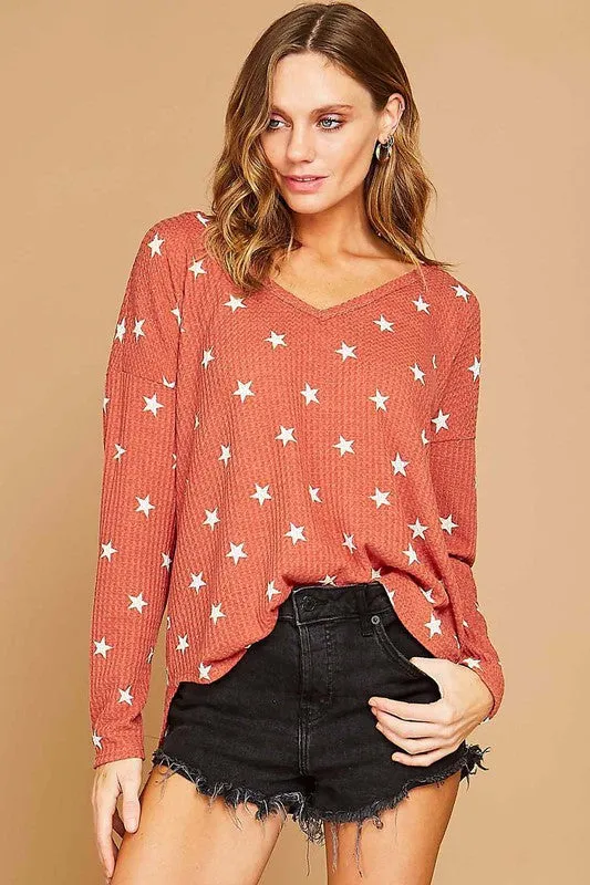 Star Printed V Neckline Knit Top - Rust